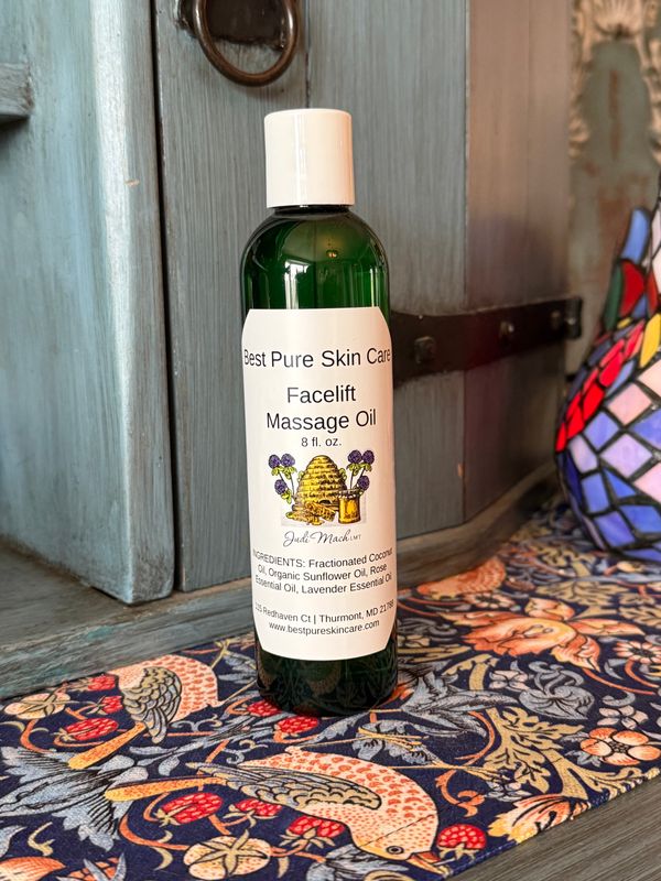 Facelift Massage Oil 8 fl. oz. green bottle of facelift massage oil by best pure skin care
