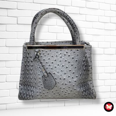 Bolso de mano efecto avestruz