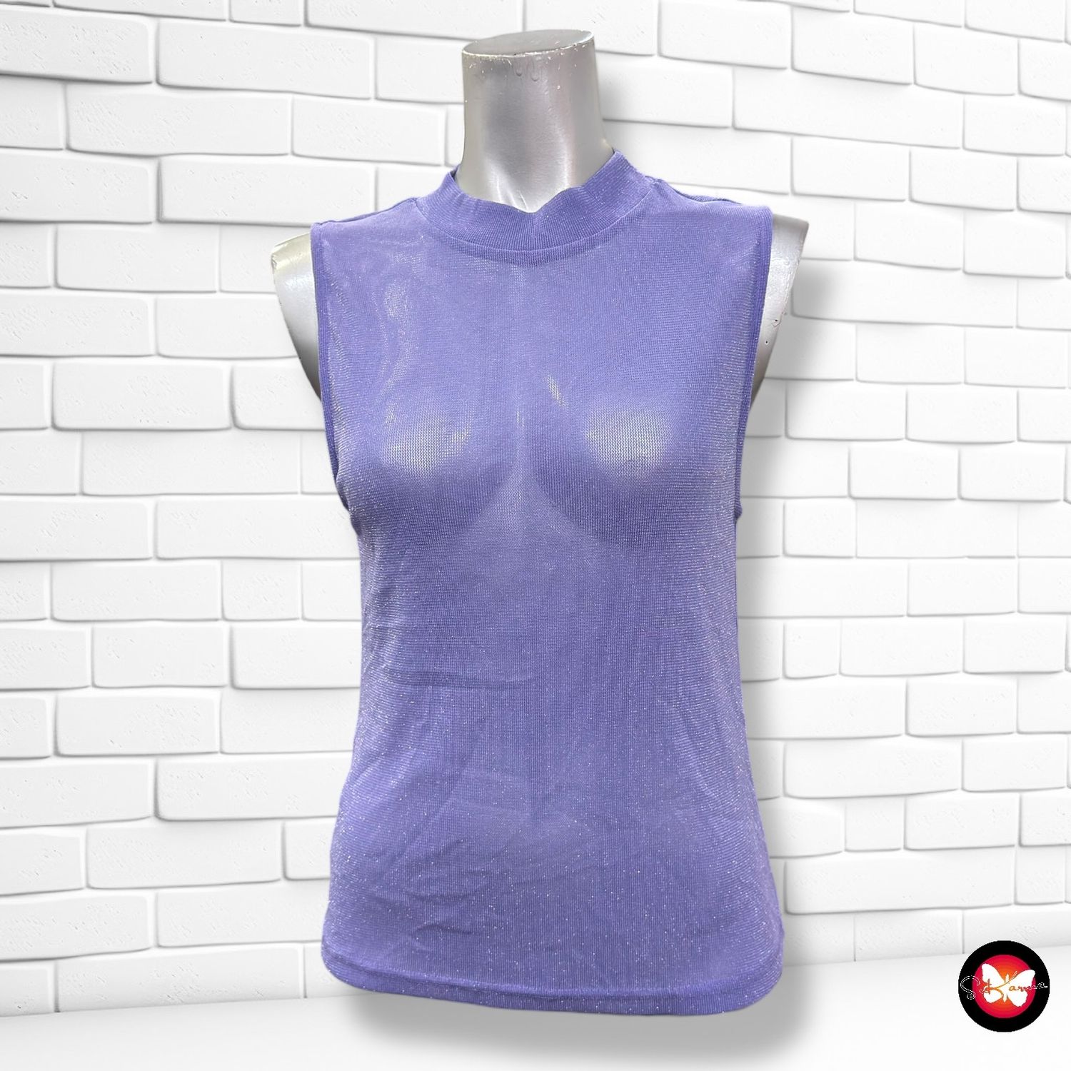 **HOY** Jersey sin mangas con lurex MANGO Talla M