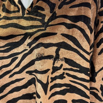 **HOY** Blusa de terciopelo animal print Talla 3XL