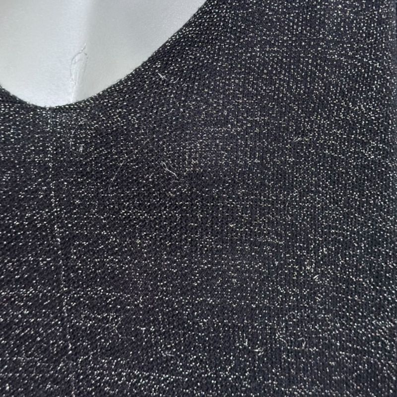 Jersey de lurex corte mariposa  color Negro y plateado Talla ÚNICA