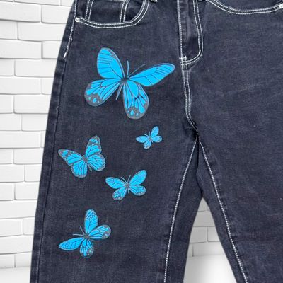 **HOY** Pantalón ancho de pierna con mariposas SHEIN color Negro vaquero Talla S