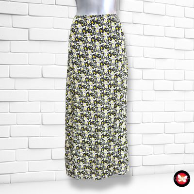 **HOY** Falda larga de florecitas  color Negro, blanco y amarillo Talla M/L