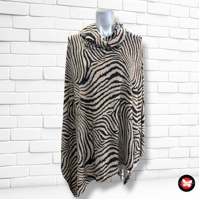 **HOY** Blusa asimétrica animal print color Camel y negro Talla ÚNICA GRANDE