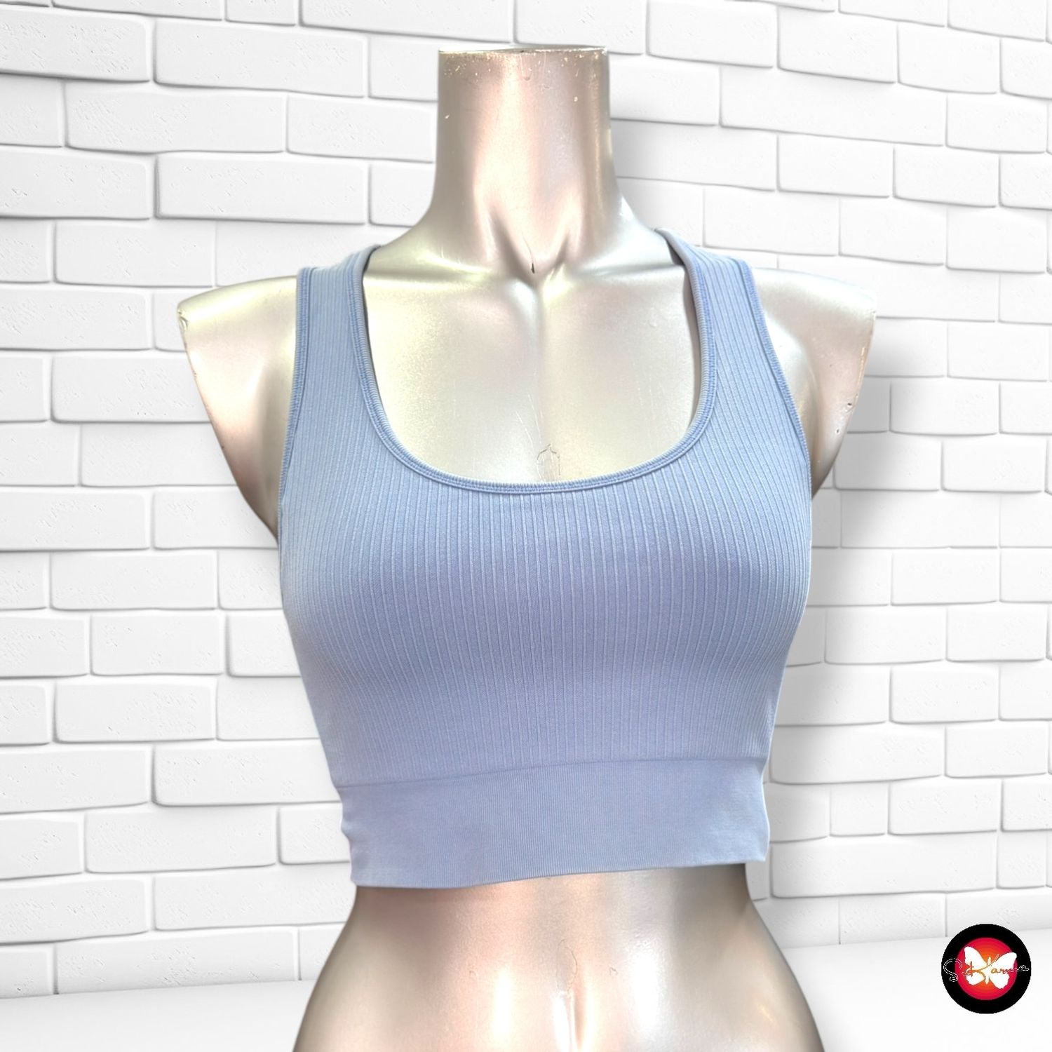 **HOY** Top deportivo  color Celeste Talla M