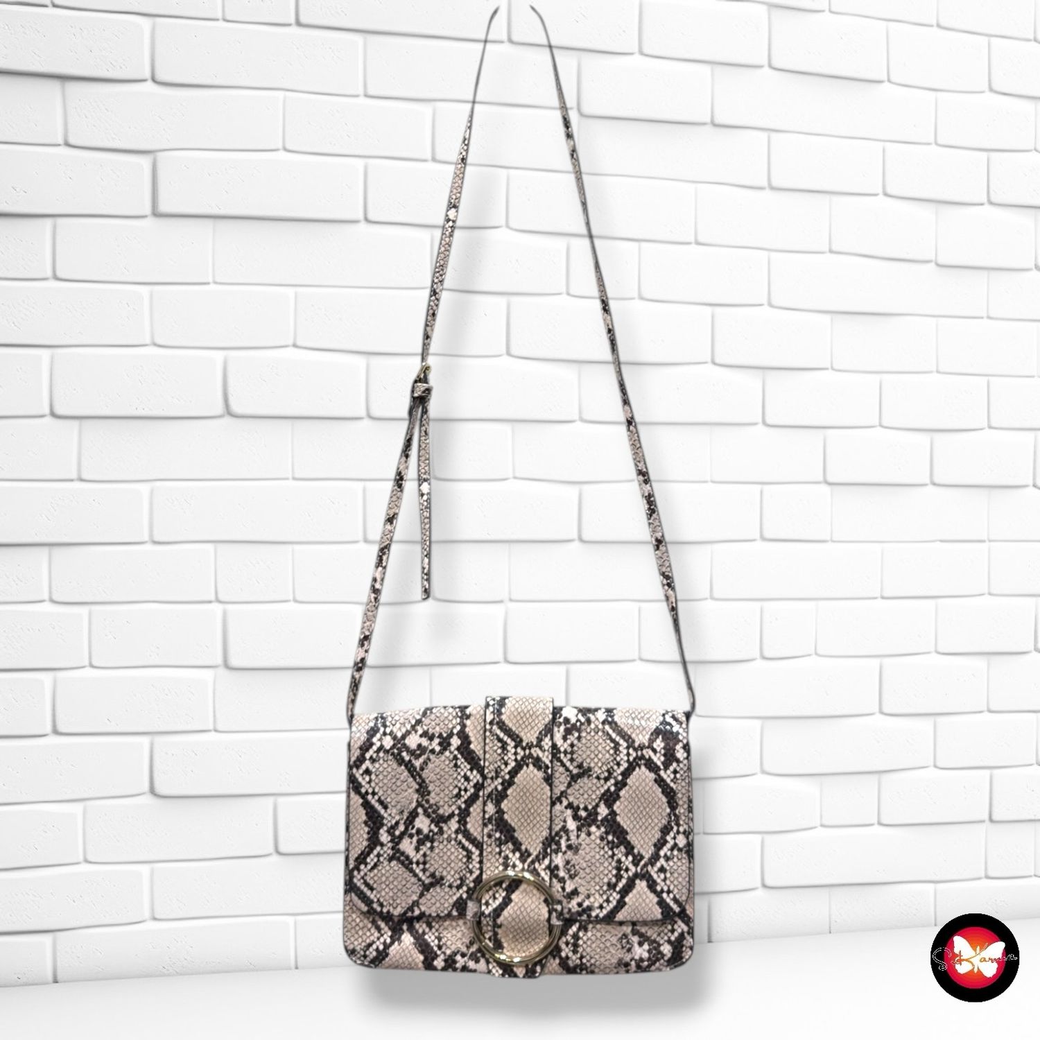 **HOY** Bolso bandolera efecto serpiente  MANGO color Beige y negro Talla PEQUEÑO