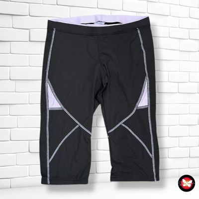 **HOY** Mallas deportivas piratas  color Negro y lila Talla 48