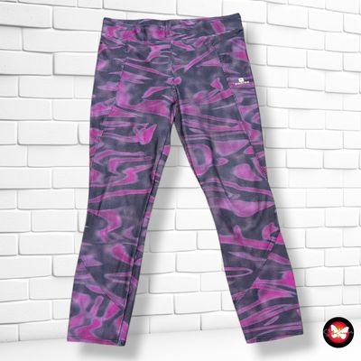 **HOY** Mallas deportivas piratas DOMYOS color Negro y morado Talla M