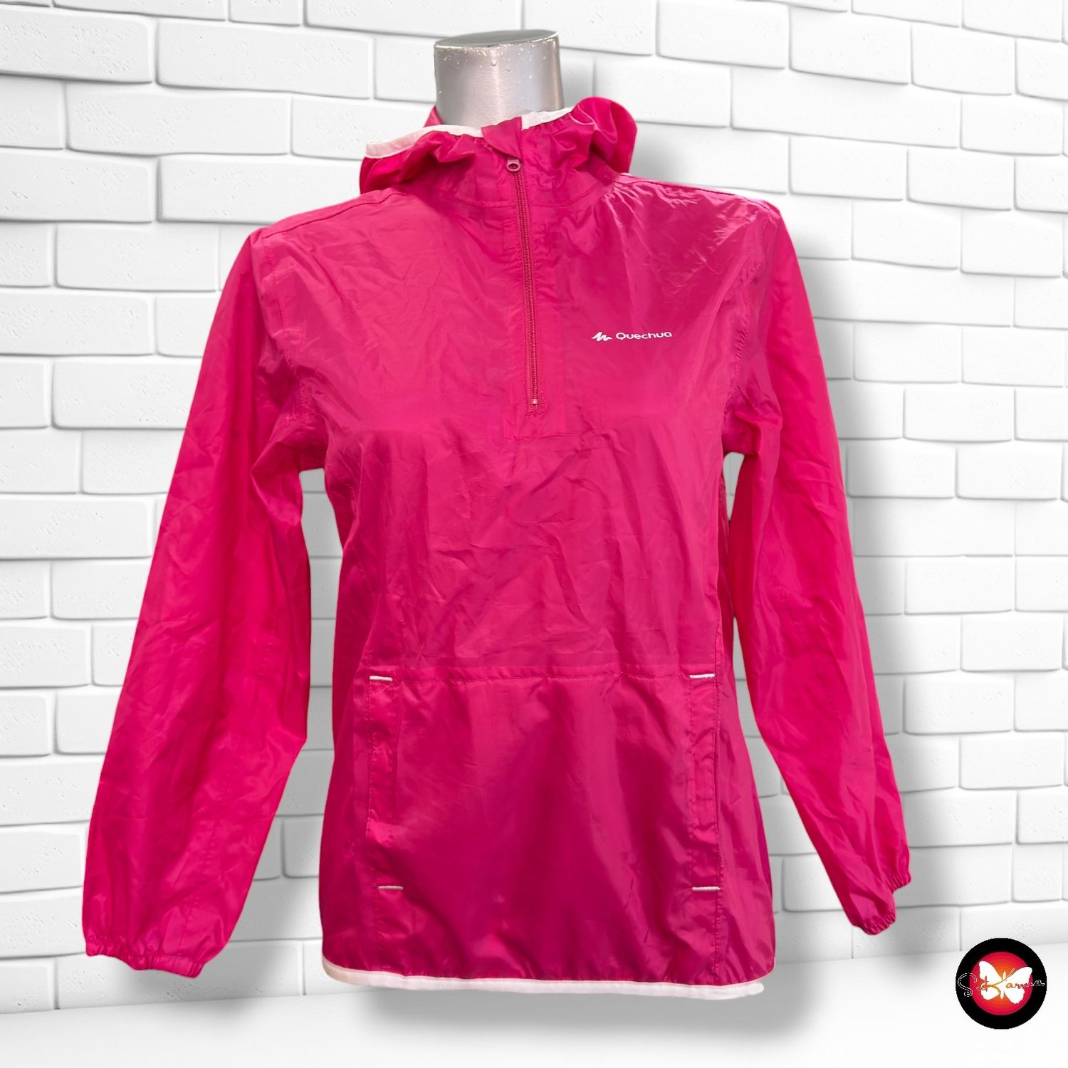 **HOY** Chubasquero QUECHUA color Fresa Talla 9-10 años