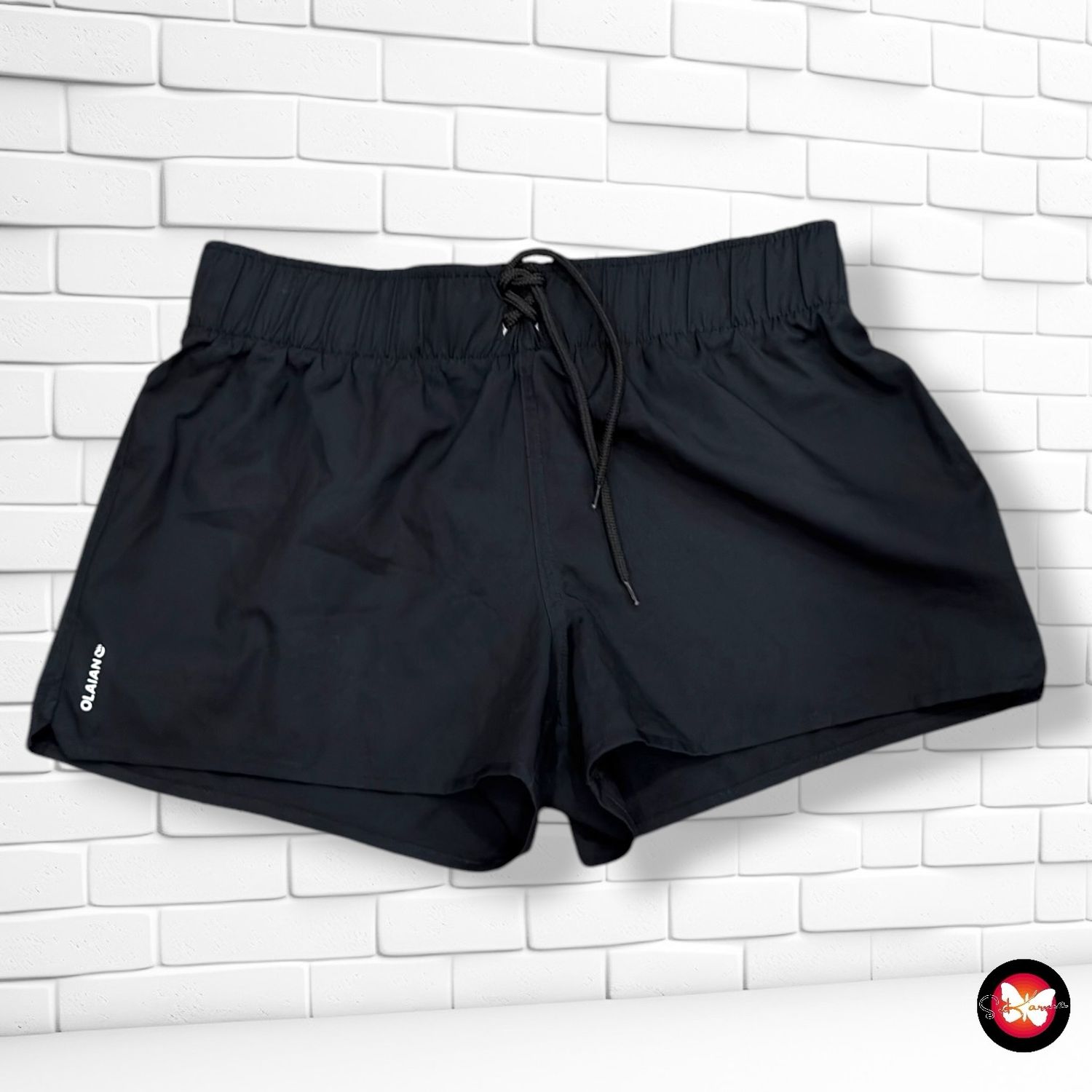 **HOY** Short playero OLAIAN color Negro Talla 38