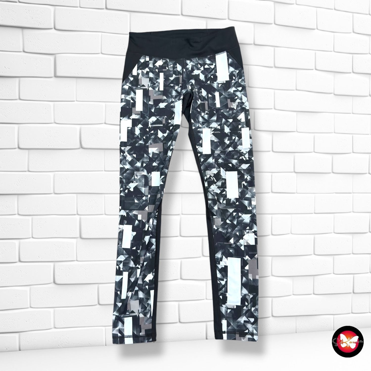 **HOY** Mallas deportivas UNDER ARMOUR color Negro y gris Talla S