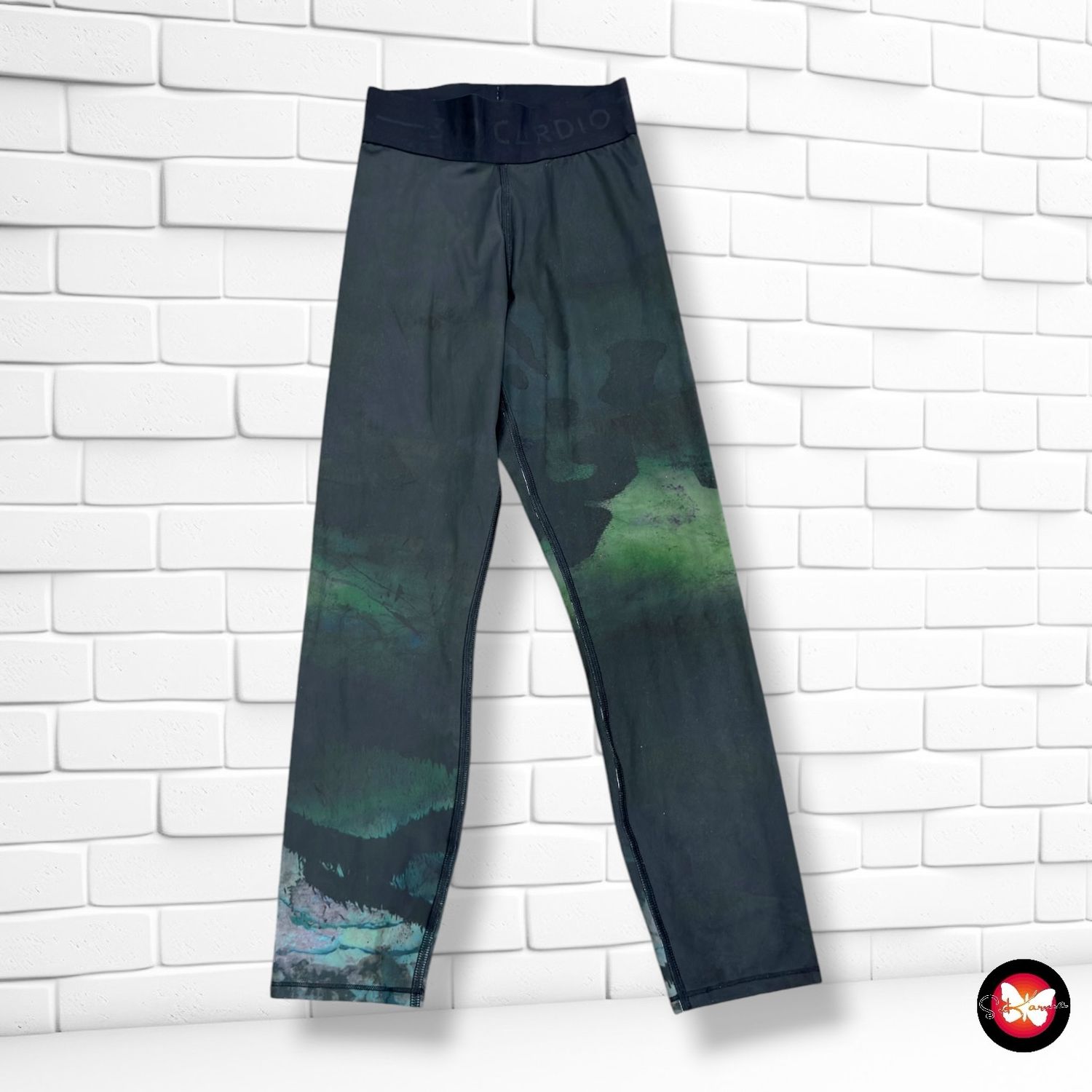 **HOY** Mallas deportivas DOMYOS color Negro y verde Talla S