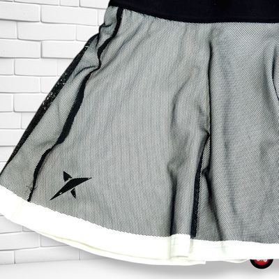 **HOY** Falda deportiva con mallitas y rejilla DROP SHOT color Negro y blanco Talla S