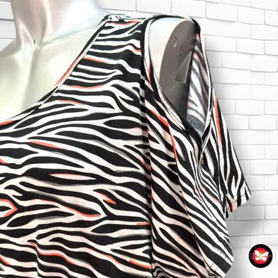 **HOY** Vestido con hombros descubiertos JANINA color Negro, blanco y naranja Talla 48