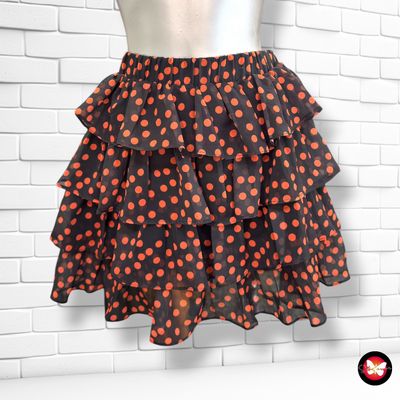 **HOY** Falda de volantes IVIVI color Negro y naranja Talla M/L (pequeña)