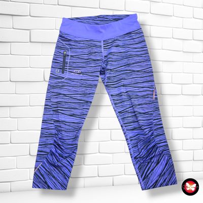 **HOY** Mallas deportivas piratas KALENJI color Violeta y negro Talla M