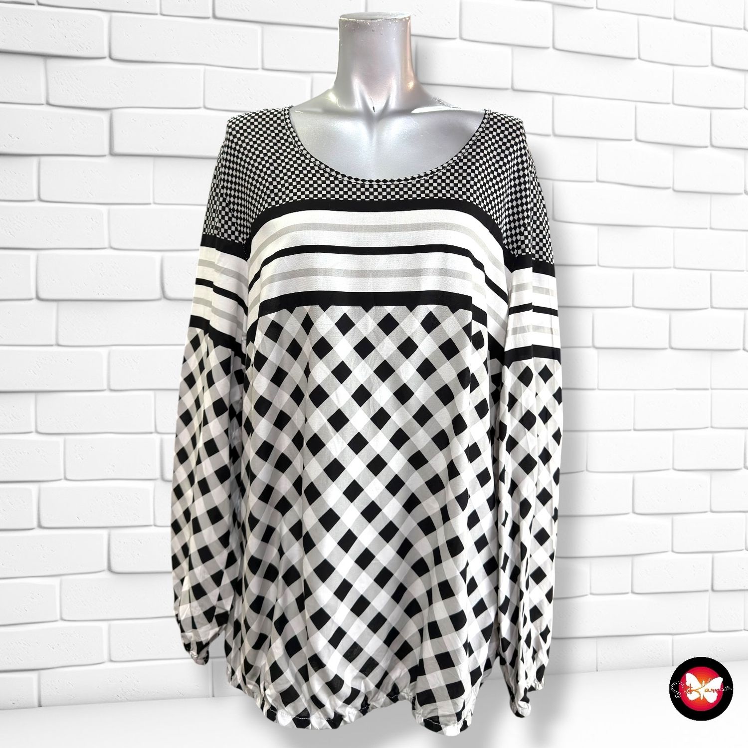 **HOY** Blusa de manga larga  color Negro y blanco Talla 46