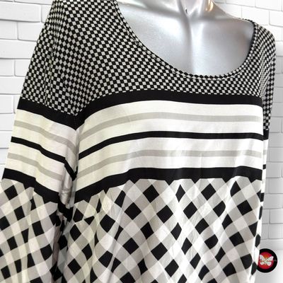**HOY** Blusa de manga larga color Negro y blanco Talla 46