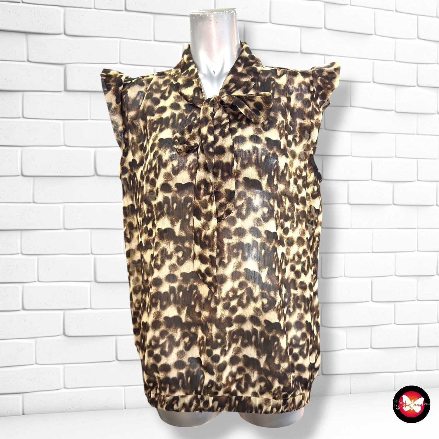 **HOY** Blusa traslúcida YESSICA color Animal print Talla 40