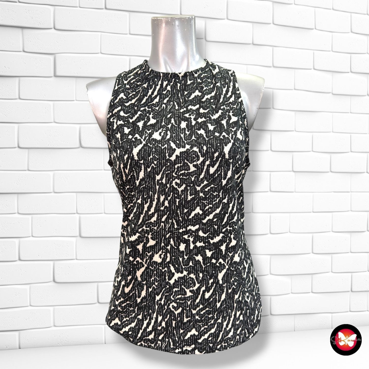 **HOY** Blusa sin mangas EKSEPT color Negro y crema Talla M