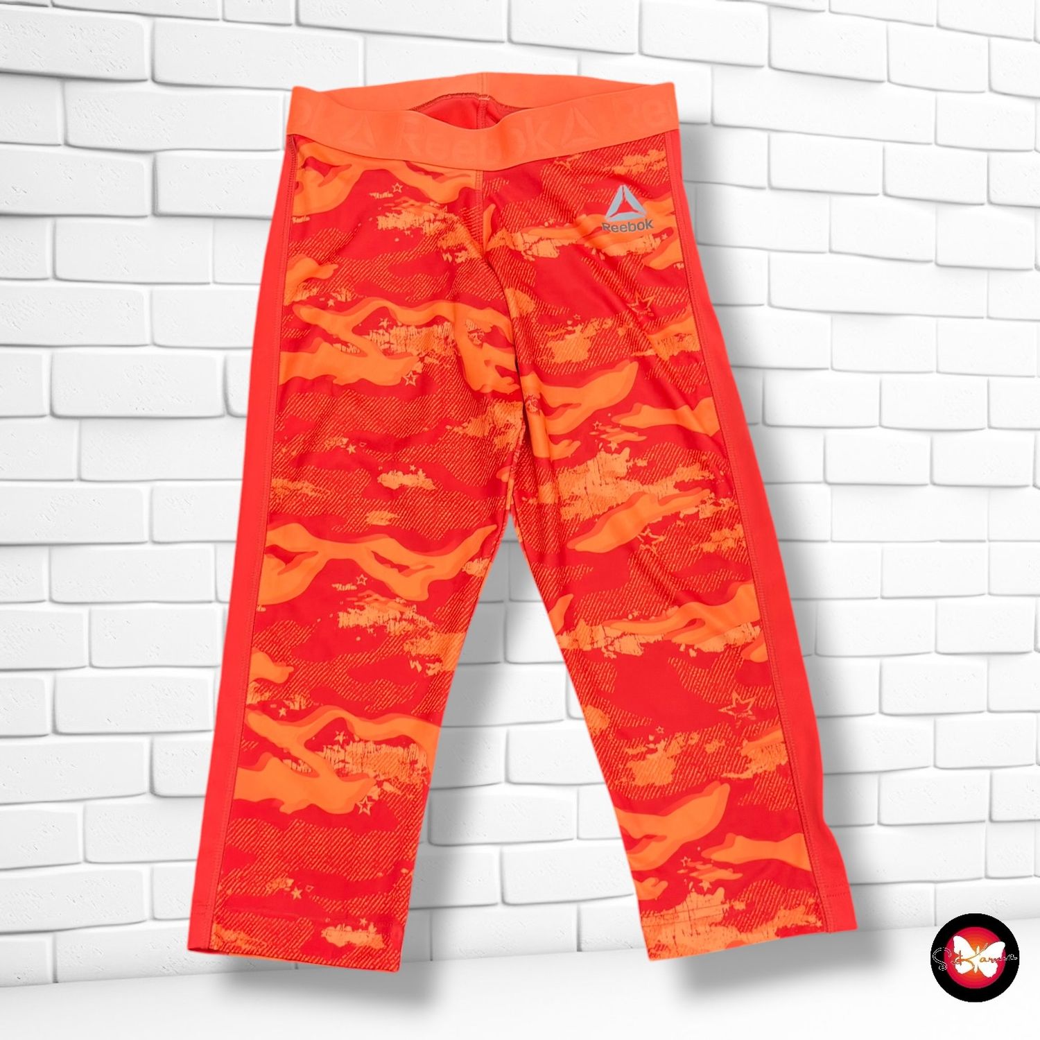 **HOY** Mallas deportivas piratas REEBOK color Rojo y naranja Talla S