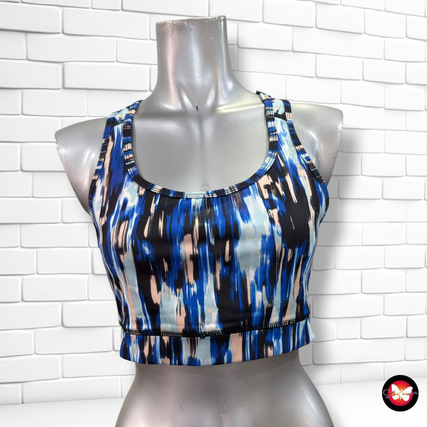 **HOY** Top deportivo  color Varios Talla L