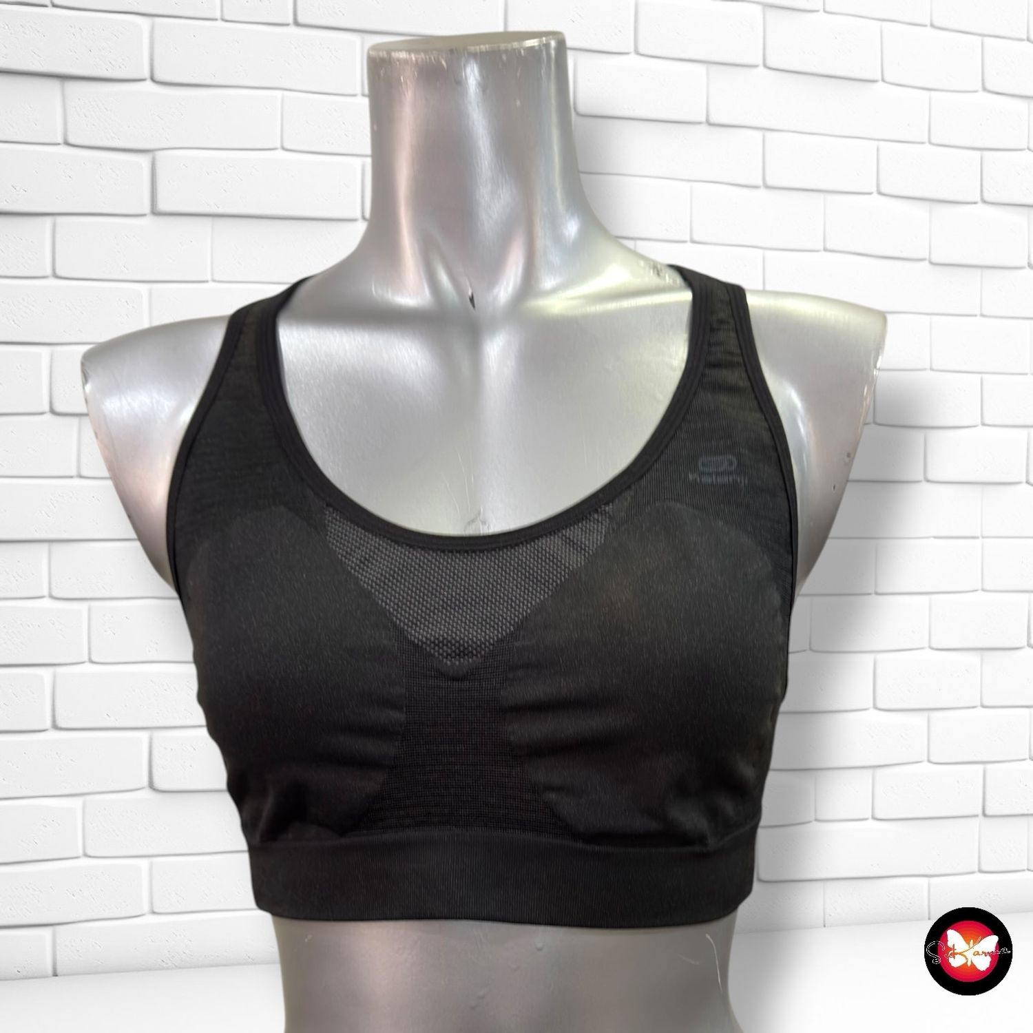 **HOY** Top deportivo KALENJI color Negro Talla S