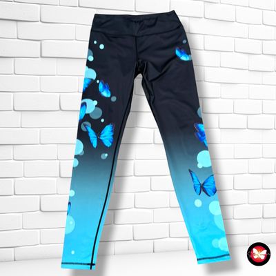 **HOY** Mallas deportivas “mariposas"  color Negro y turquesa Talla M
