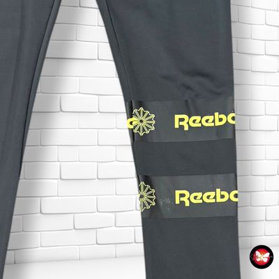 **HOY** Mallas deportivas REEBOK color Gris y neón Talla XS