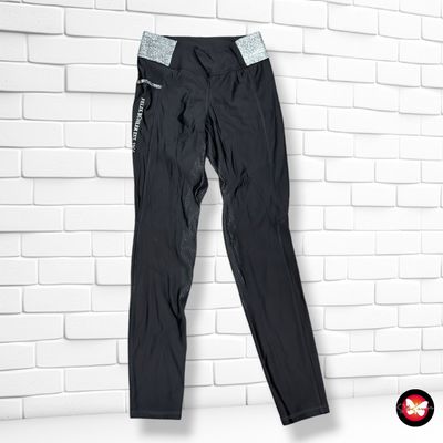 **HOY** Mallas deportivas engomadas  color Negro y plateado Talla 40/42