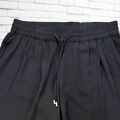 **HOY** Pantalón sueltito ZARA color Negro Talla S (grande)