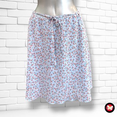 **HOY** Falda de florecitas BLUE MOTION color Celeste y varios Talla 40/42