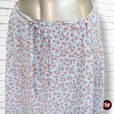 **HOY** Falda de florecitas BLUE MOTION color Celeste y varios Talla 40/42