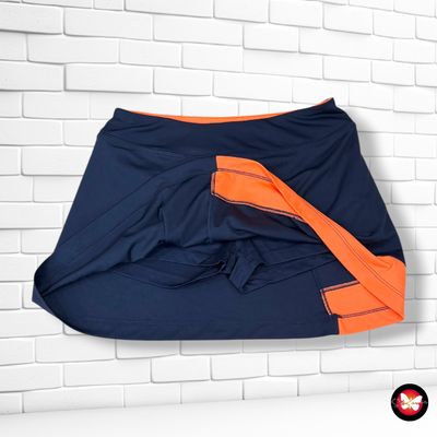**HOY** Falda deportiva con mallitas CRANE color Azul marino y naranja Talla S