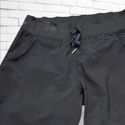 **HOY** Pantalón deportivo cortavientos pirata KYODAN color Negro Talla S