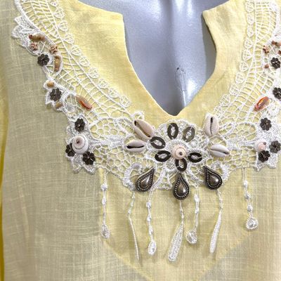**HOY** Blusa con caracolas TROPPO color Amarillo Talla 50