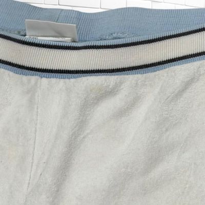 **HOY** Pantalón de chándal pirata de peluchito PUMA color Hueso Talla M