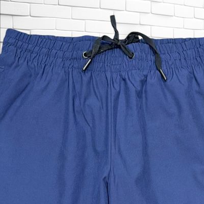 **HOY** Pantalón deportivo cortavientos CRIVIT color Azul marino Talla 44
