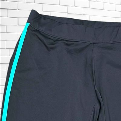**HOY** Mallas deportivas color Negro y verde Talla L
