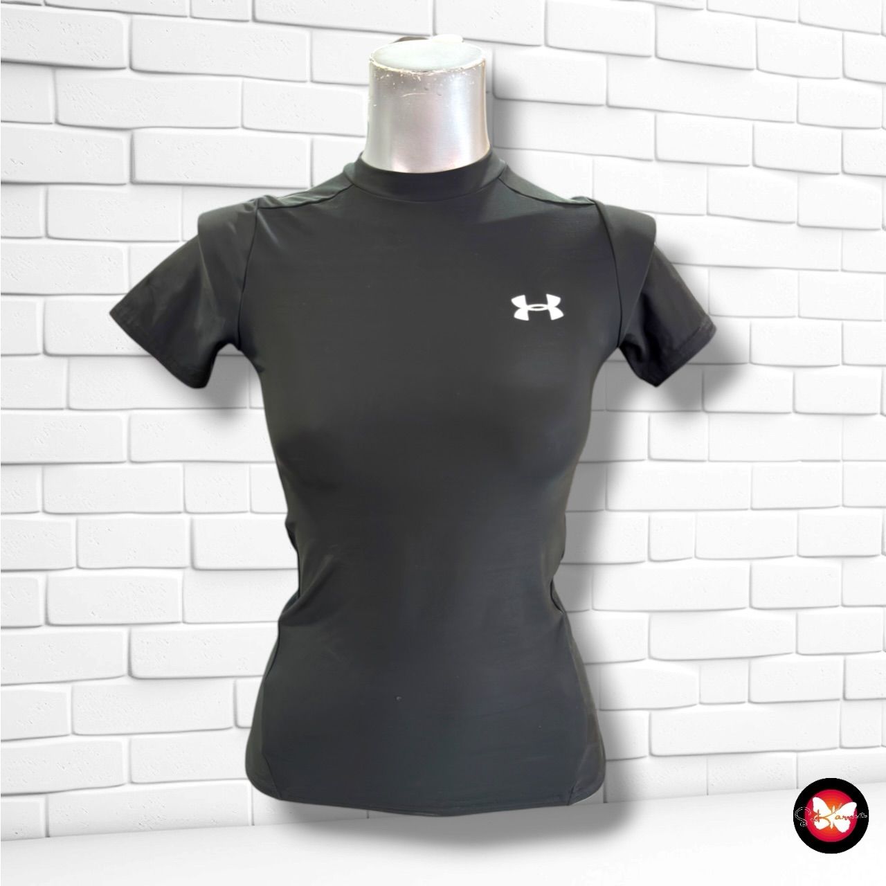 **HOY** Camiseta deportiva UNDER ARMOUR color Negro Talla 10-12 años