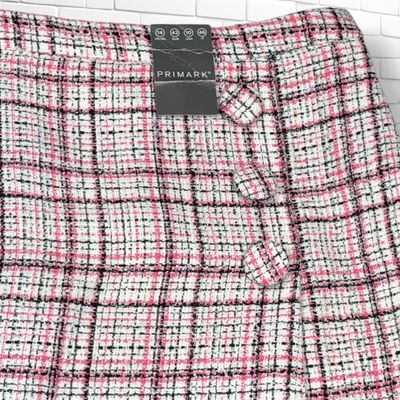**HOY** Falda tweed PRIMARK color Crema, negro y rosa Talla 42