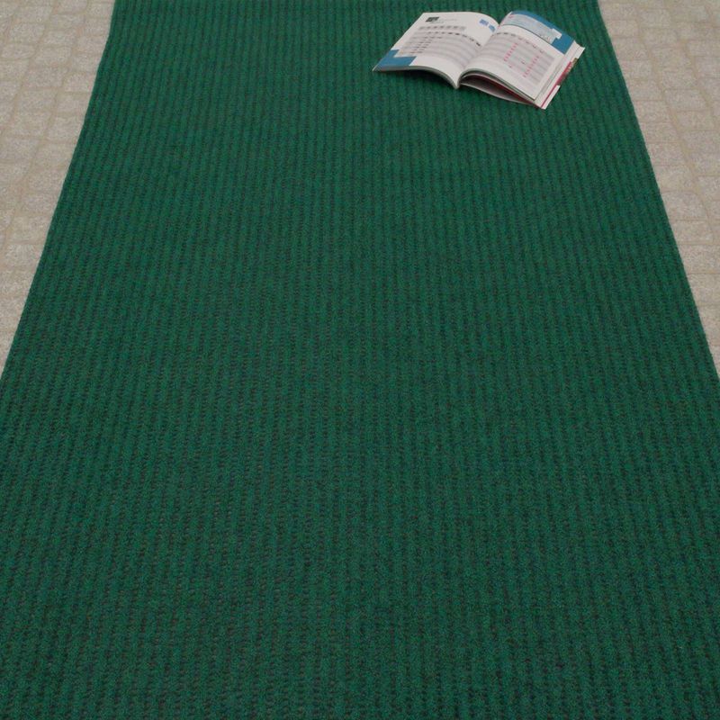 AKO Sicherheitsmatte in der Farbe Grün. Auf dem Bild ist die Matte ausgerollt auf ebenem Untergrund.