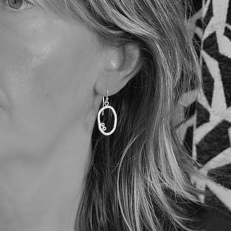 Organic earrings in silver with small details