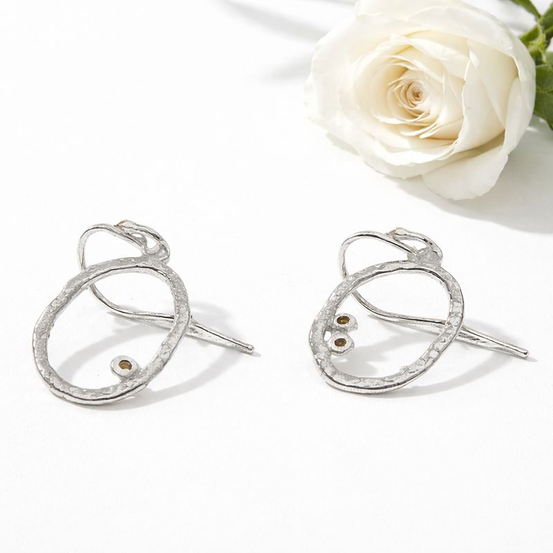 Organic earrings in silver with small details