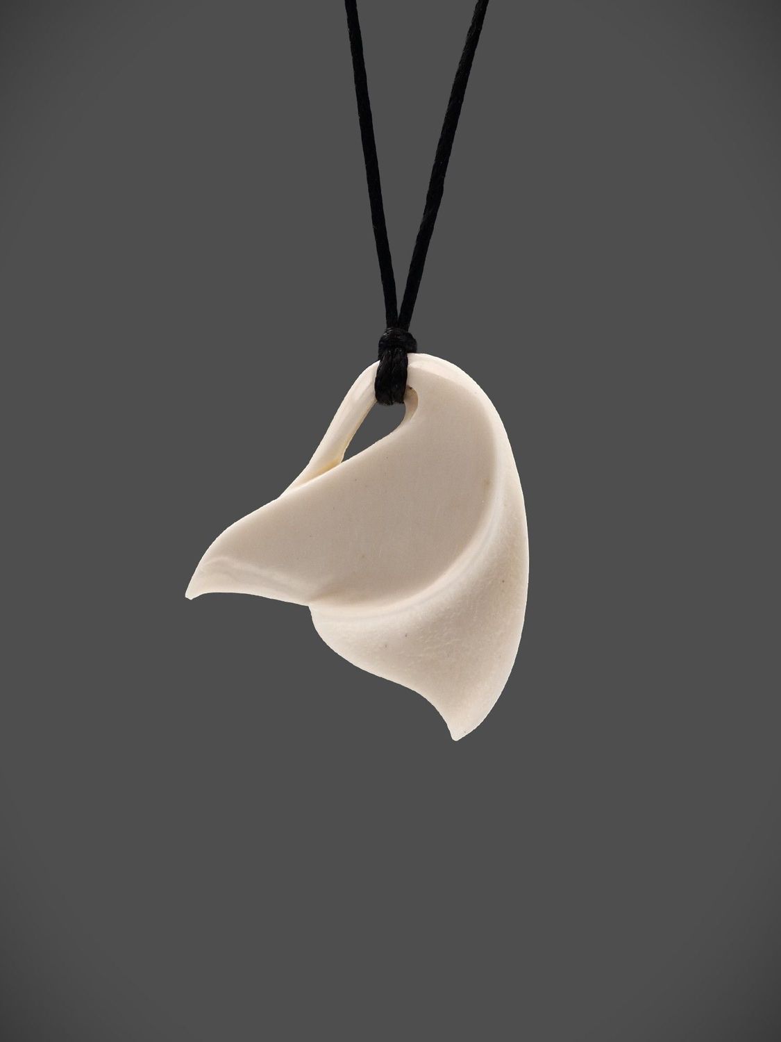 Moko Pounamu Whale Tail Bone Carving - Okuku Moko Pounamu Whale Tail Bone Carving - Okuku