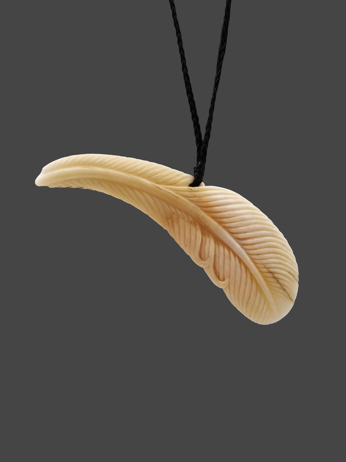 Moko Pounamu Bone Carving Double Twist Heru (Comb) Moko Pounamu Bone Carving Double Twist Heru (Comb)
