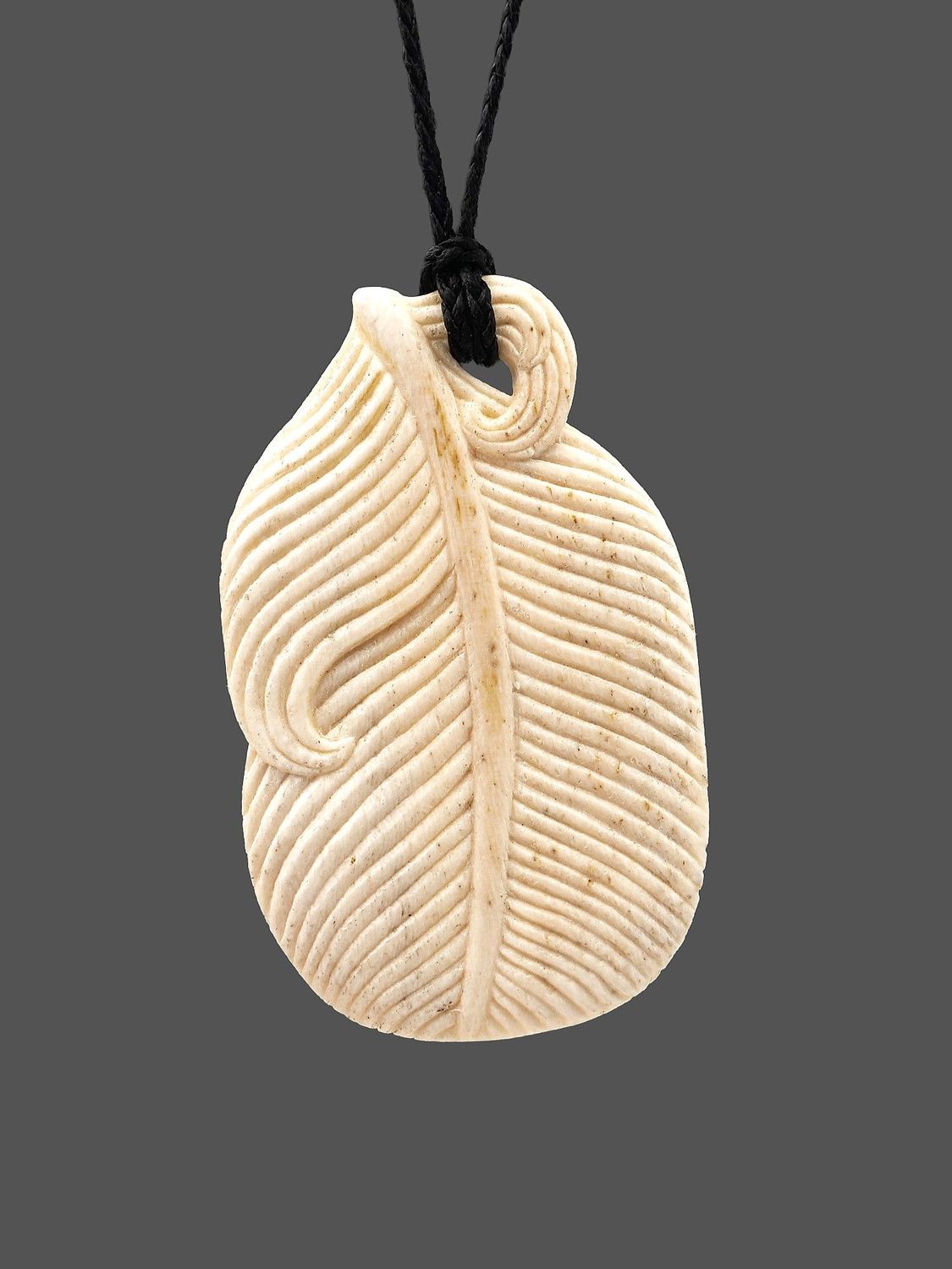 Moko Pounamu Huru (Feather) Genuine Whale Bone Carving - Waitakere Moko Pounamu Huru (Feather) Genuine Whale Bone Carving - Waitakere