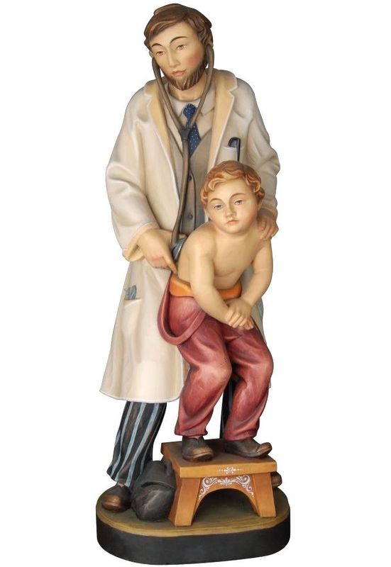 Statue en bois du médecin avec l'enfant