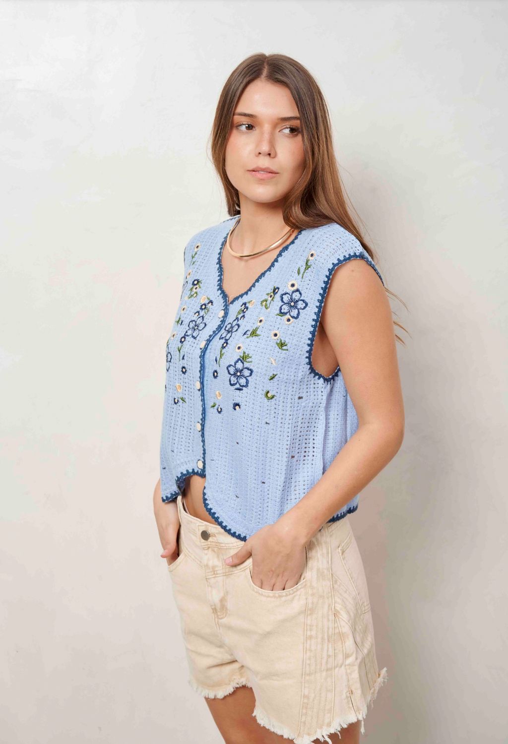 CHALECO FLOR CELESTE