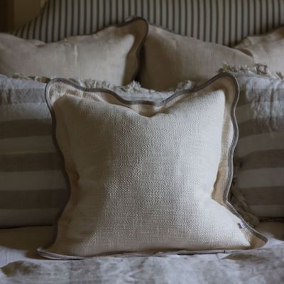 Chloe cream/greige scalloped cushion is perfect for a country cottage home or modern townhouse.